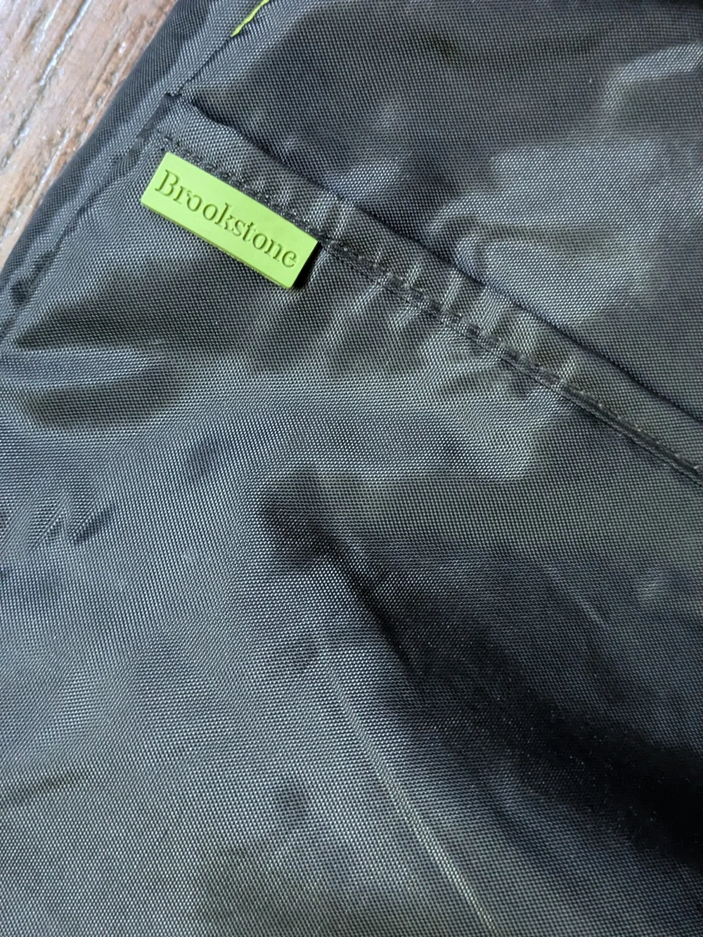 Brookstone Black Messenger Sling Bag with Green Accent